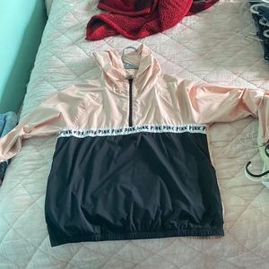 A PINK rain jacket in size medium in women’s for $15 dollars
